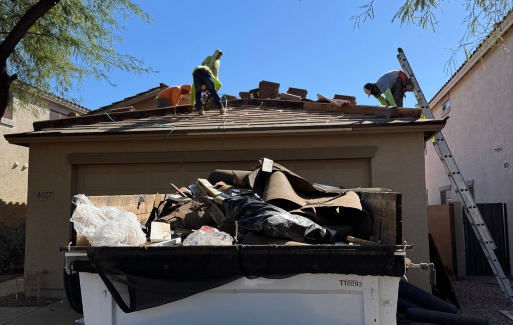Residential roof being replaced by Vivid Roofs